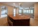 Kitchen island with granite countertop and stainless steel appliances at 1788 Amarone Way, Henderson, NV 89012