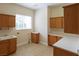 Bright laundry room with ample cabinet space at 1788 Amarone Way, Henderson, NV 89012