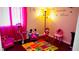 Adorable playroom featuring a Mickey Mouse theme and bright colors at 1972 Weenap Dr, Las Vegas, NV 89108