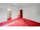 Bedroom with red carpet and access to closet and other rooms at 2105 Berkley Ave, Las Vegas, NV 89101