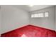 Bright bedroom with red carpet and window at 2105 Berkley Ave, Las Vegas, NV 89101