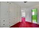 White built-ins and red carpet in hallway at 2105 Berkley Ave, Las Vegas, NV 89101