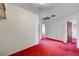 Hallway with built-in storage and red carpet at 2105 Berkley Ave, Las Vegas, NV 89101