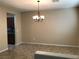 Formal dining room with tile floors and a chandelier at 2416 Weaverville Dr, Henderson, NV 89044