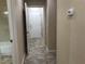 Hallway with tile flooring and door at 2416 Weaverville Dr, Henderson, NV 89044