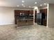 Spacious kitchen with island, stainless steel appliances, and granite countertops at 2416 Weaverville Dr, Henderson, NV 89044