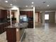 Eat-in kitchen features an island, updated appliances, and stylish cabinetry at 2416 Weaverville Dr, Henderson, NV 89044