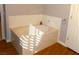 Bathroom with garden tub and hardwood floor at 2525 Huber Heights Dr, Las Vegas, NV 89128