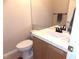 Small bathroom with toilet and vanity at 2525 Huber Heights Dr, Las Vegas, NV 89128