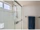 Shower stall with glass enclosure and white tile surround at 2525 Huber Heights Dr, Las Vegas, NV 89128