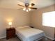 Simple bedroom with a double bed and a nightstand at 2525 Huber Heights Dr, Las Vegas, NV 89128