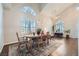 Bright dining room with hardwood floors and plantation shutters at 2525 Huber Heights Dr, Las Vegas, NV 89128