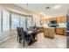 Kitchen with light wood cabinets, stainless steel appliances, and island at 2525 Huber Heights Dr, Las Vegas, NV 89128