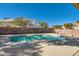 Relaxing kidney-shaped pool in a private backyard at 2525 Huber Heights Dr, Las Vegas, NV 89128