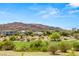 Community overview showcasing homes and landscape at 2623 Turtle Head Peak Dr, Las Vegas, NV 89135