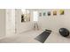 Bright home gym with room for yoga and weight training at 2623 Turtle Head Peak Dr, Las Vegas, NV 89135