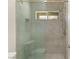 Spacious shower with glass enclosure and built-in seat at 2623 Turtle Head Peak Dr, Las Vegas, NV 89135