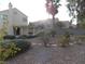 Backyard with gravel landscaping and stone pathway at 2662 Churchill Cir, Henderson, NV 89074