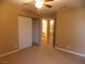 Spacious bedroom with mirrored closet and access to bathroom at 2662 Churchill Cir, Henderson, NV 89074