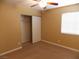 Bedroom with ceiling fan and sliding door closet at 2662 Churchill Cir, Henderson, NV 89074