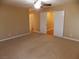 Large bedroom with ceiling fan and carpet flooring at 2662 Churchill Cir, Henderson, NV 89074