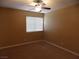 Bedroom with ceiling fan and carpet flooring at 2662 Churchill Cir, Henderson, NV 89074