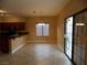 Bright dining area with tile floors and sliding glass door access at 2662 Churchill Cir, Henderson, NV 89074