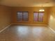 Bright dining area with tile flooring and window blinds at 2662 Churchill Cir, Henderson, NV 89074