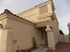 Two-story stucco home with Spanish-style tile roof at 2662 Churchill Cir, Henderson, NV 89074