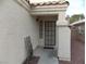 Inviting front entry with a covered porch and stucco exterior at 2662 Churchill Cir, Henderson, NV 89074