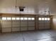 Three-car garage with automatic door openers at 2662 Churchill Cir, Henderson, NV 89074