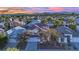 Aerial view of house and neighborhood with mountain backdrop at 295 Blackstone River Ave, Las Vegas, NV 89148