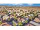 Aerial view of a residential neighborhood with mountain views at 295 Blackstone River Ave, Las Vegas, NV 89148