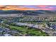 Aerial view of community near golf course and mountain range at 295 Blackstone River Ave, Las Vegas, NV 89148