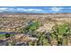 Aerial view of a community near a golf course and clubhouse at 295 Blackstone River Ave, Las Vegas, NV 89148