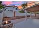 Fire pit and covered patio in a spacious backyard at 295 Blackstone River Ave, Las Vegas, NV 89148