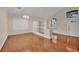 Bright dining room with hardwood floors and a view to the living room at 295 Blackstone River Ave, Las Vegas, NV 89148