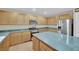 Spacious kitchen with stainless steel appliances and island at 295 Blackstone River Ave, Las Vegas, NV 89148