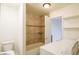 Bathroom with tub, shower, and tiled floors at 3017 Saint George St # B, North Las Vegas, NV 89030