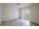 Spacious bedroom with tile floors and access to patio at 3017 Saint George St # B, North Las Vegas, NV 89030