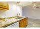 Modern kitchen with granite countertops and stainless steel sink at 3017 Saint George St # B, North Las Vegas, NV 89030