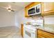 Updated kitchen, granite counters, and white appliances at 3017 Saint George St # B, North Las Vegas, NV 89030