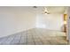 Open living room with tile flooring and neutral walls at 3017 Saint George St # B, North Las Vegas, NV 89030