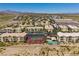 Aerial view of community with pool, tennis courts, and ample parking at 3550 Bay Sands Dr # 2051, Laughlin, NV 89029