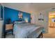 Blue-walled bedroom with a double bed and plenty of space at 3550 Bay Sands Dr # 2051, Laughlin, NV 89029