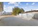 Spacious backyard with a concrete patio and a high fence for privacy at 4027 Boratko St, Las Vegas, NV 89115