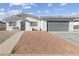 House exterior with gray garage door and front yard at 4027 Boratko St, Las Vegas, NV 89115