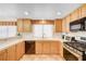 Modern kitchen featuring stainless steel appliances and ample counter space at 408 Matecumbe Way, Boulder City, NV 89005