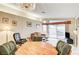 Living room with fireplace, patio access and a view, and seating area at 408 Matecumbe Way, Boulder City, NV 89005