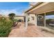 Covered patio with lounge chairs and mountain views at 408 Matecumbe Way, Boulder City, NV 89005